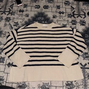 Elegant Striped Cream and Black Sweater